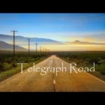 Дорога Telegraph Road з телеграфними стовпами на світанку в пустелі