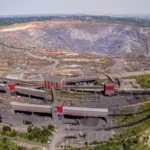 Аерофото карєру та червоно-сірих споруд Південного ГЗК у Кривому Розі