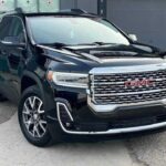 Чорний позашляховик GMC на випробувальному полігоні General Motors у Мілфорді