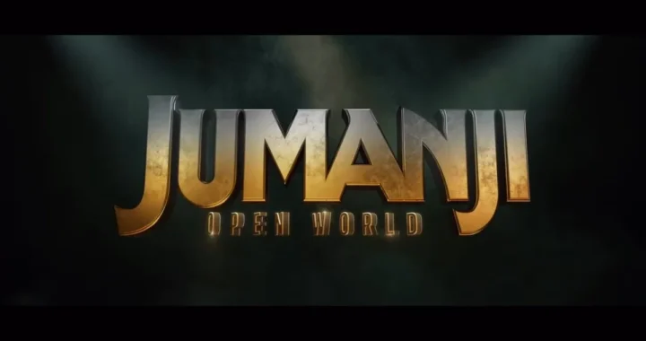 Золотий логотип Jumanji Open World на темному тлі з променями світла