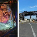 Пожежник гасить вогонь у зруйнованій будівлі та каркас знищеного складу з уламками