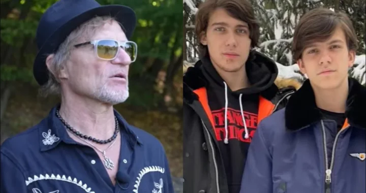 Олег Скрипка в капелюсі й окулярах і двоє юнаків на тлі дерев